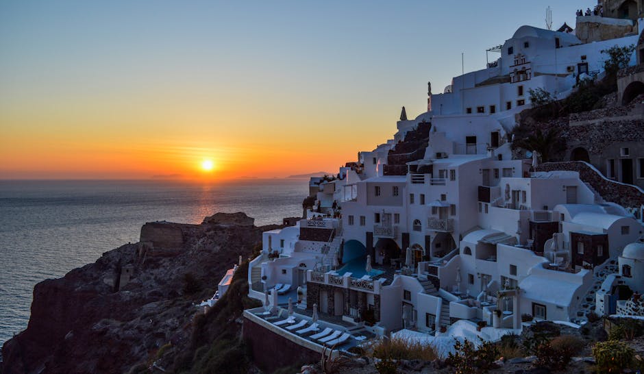 Santorini Dome Villas With White Walls and Sea-Edge Hammocks