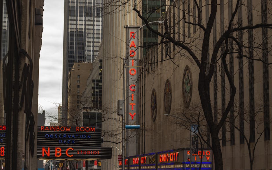 New York Rooftop Hotels With Skyline Bars and Neon Walls