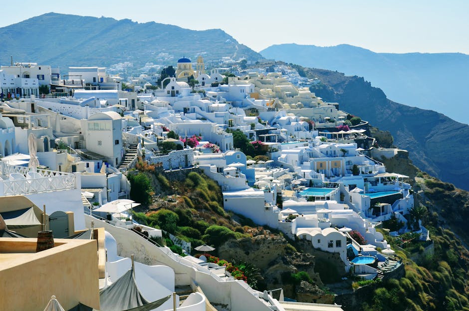 Santorini Cliff Hotels With Dome Walls and White Floors