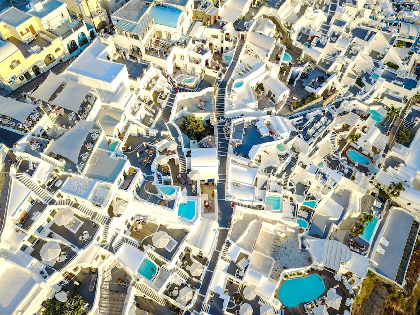 Santorini Dome Hotels With White Ceilings and Infinity Pools